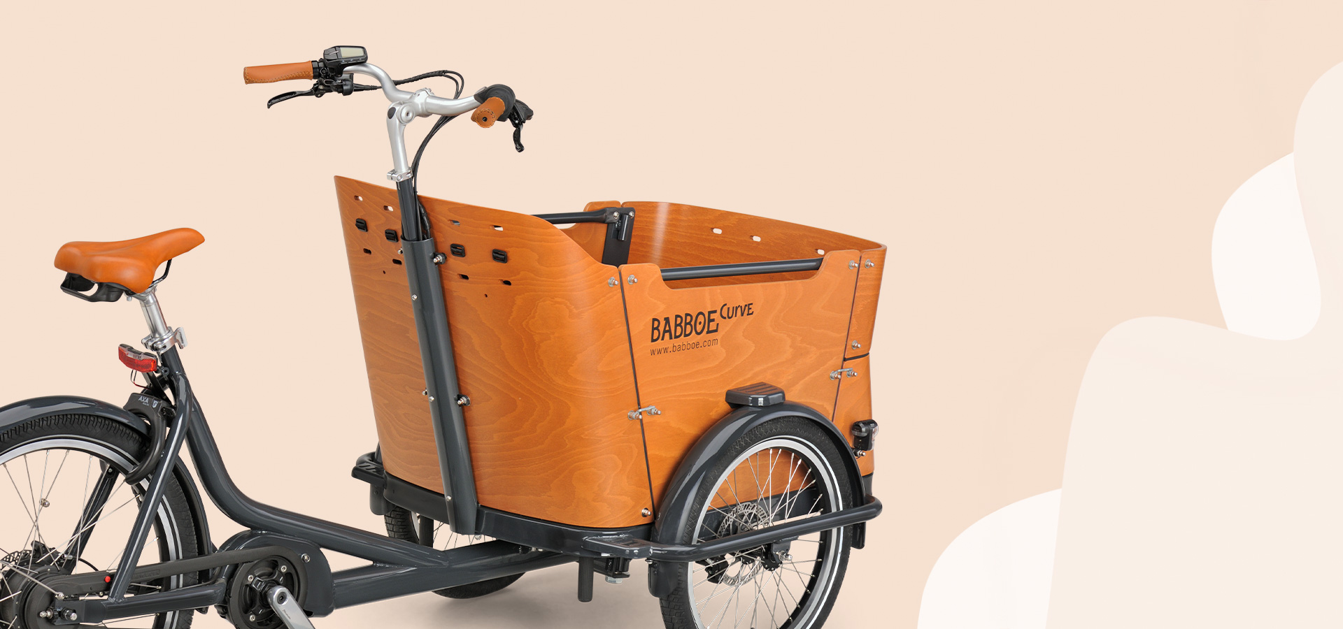 Ã‰lÃ©gant et abordable â€” le triporteur Babboe Curve, qui allie _confort et transport familial_